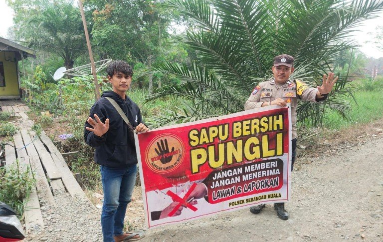 Door To Door Polsek Sebangau Kuala laksanakan sosialisasi Saber Pungli.