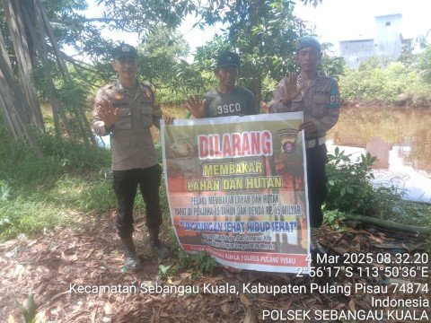 Polsek Sebangau Kuala Mensosialisasikan Himbauan Melarang Membakar Hutan atau lahan