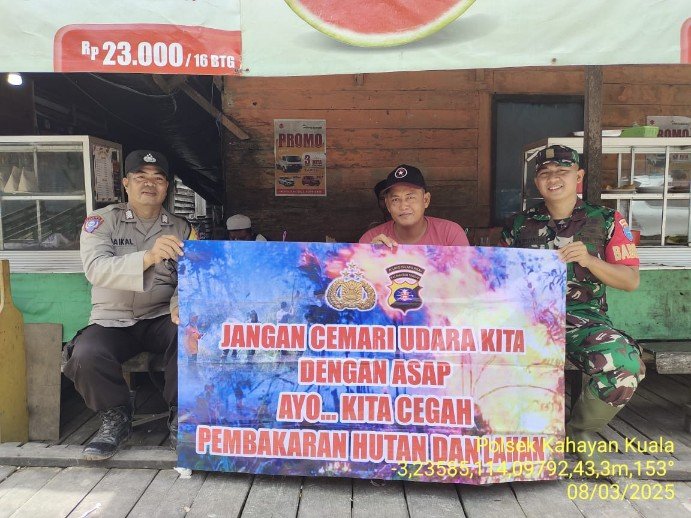 Personel Polsek Kahayan Kuala sambangi warga dan Memberikan himbauan Tentang Larangan Membakar hutan dan lahan