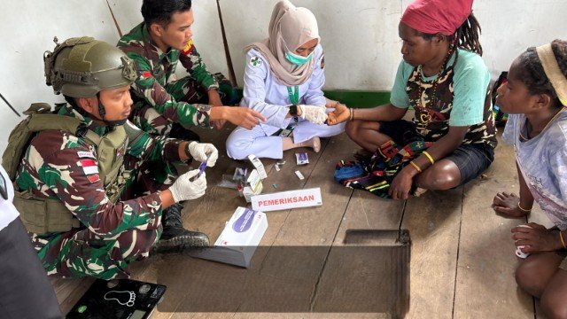 Satgas Pam Obvitnas PT. Freeport Indonesia Yonif 611/Awang Long Gelar Kegiatan Posyandu Dengan Masyarakat Mimika