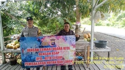 Personel Polsek Kahayan Kuala sambangi warga dan Memberikan himbauan Tentang Larangan Membakar hutan dan lahan