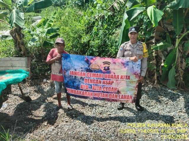 Personel Polsek Kahayan Kuala sambangi warga dan Memberikan himbauan Tentang Larangan Membakar hutan dan lahan