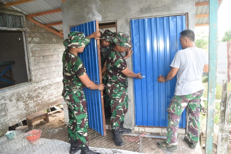 Satgas TMMD ke-124 Kodim 1002/HST Terus Genjot Rehab Langgar Darussalam, Fokus Pemasangan Pintu WC