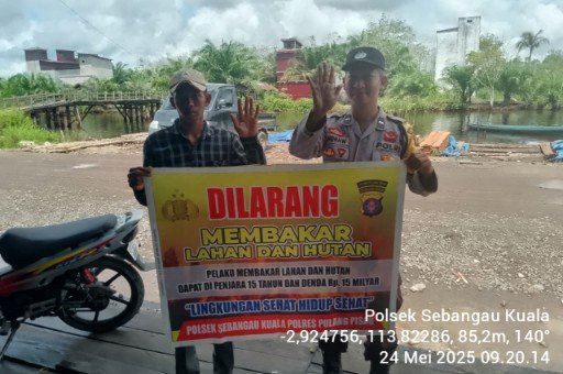 Polsek Sebangau Kuala Mensosialisasikan Himbauan Melarang Membakar Hutan atau lahan kepada Masyarakat