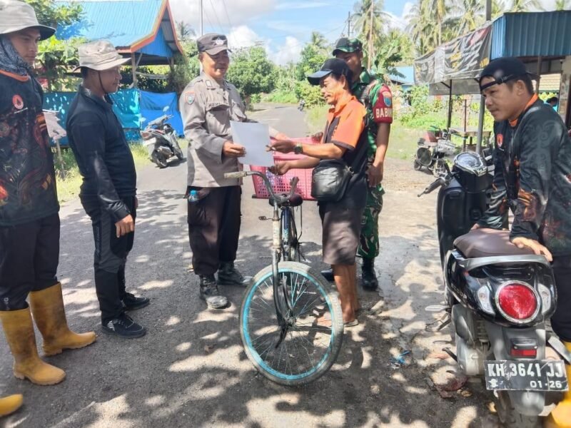 Personel Polsek Kahayan Kuala sambangi warga dan Memberikan himbauan Tentang Larangan Membakar hutan dan lahan