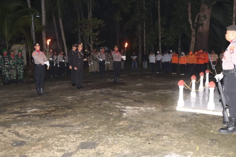 Malam Hening Penuh Doa, Polres Pulang Pisau Laksanakan Renungan Suci HUT RI ke-80 di TMP HM Sanusi