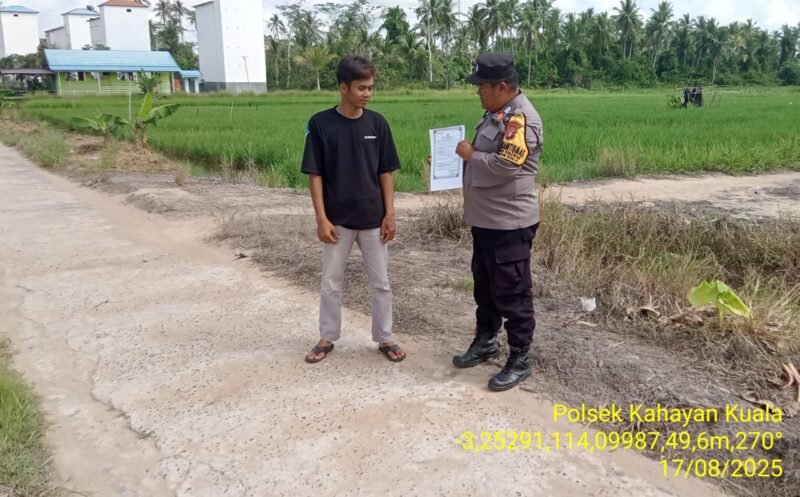 Personel Polsek Kahayan Kuala sambangi warga dan Memberikan himbauan Tentang Larangan Membakar hutan dan lahan.