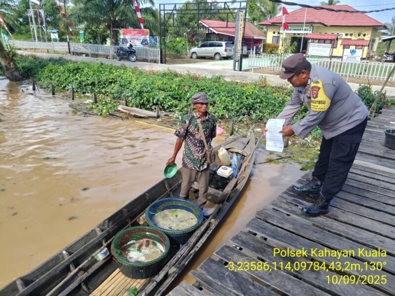 Personel Polsek Kahayan Kuala sambangi warga dan Memberikan himbauan Tentang Larangan Membakar hutan dan lahan