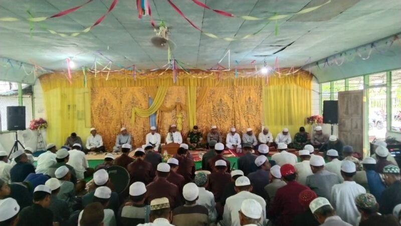 Babinsa Koramil 1002-03/Haruyan Bersama Banser Amankan Peringatan Maulid Nabi Muhammad SAW