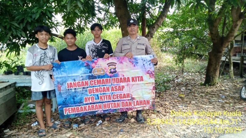 Personel Polsek Kahayan Kuala sambangi warga dan Memberikan himbauan Tentang Larangan Membakar hutan dan lahan.