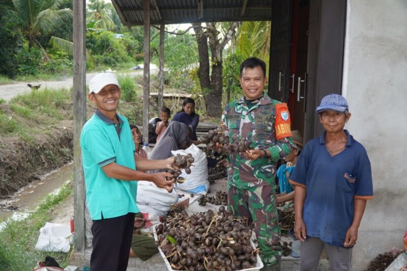 Senyum Bahagia Petani Jengkol, Jalan Diperbaiki Satgas TMMD ke-126 Kodim 1208/Sambas