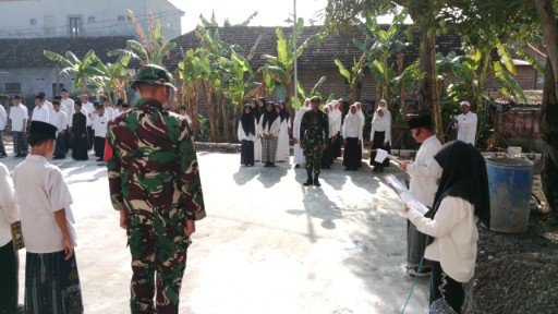 Satgas TMMD dan Santri Bersatu, Nasionalisme Tumbuh di Hari Santri foto/Satgas TMMD