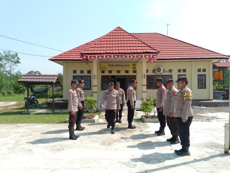 Personil polsek sebangau kuala melaksanakan serah terima piket penjagaan mako polsek sebangau kuala