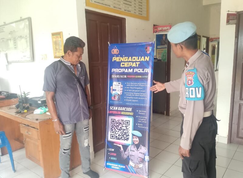 TargetNews.ID/Redaksi/Foto/Unit Propam Polsek Sebangau Kuala Polres Pulang Pisau memperkenalkan barcode Yanduan yang dapat diakses melalui aplikasi atau website. Masyarakat dapat dengan mudah mengakses layanan Yanduan dengan memindai barcode yang disediakan
