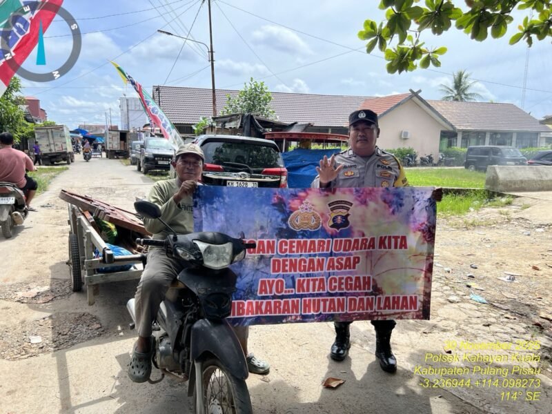 Personel Polsek Kahayan Kuala sambangi warga dan Memberikan himbauan Tentang Larangan Membakar hutan dan lahan.