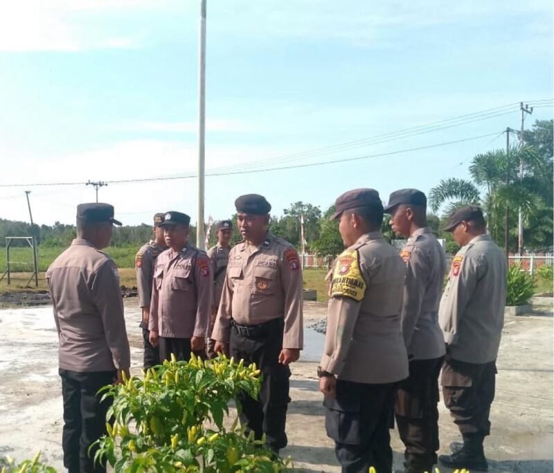 Personil polsek sebangau kuala melaksanakan serah terima piket penjagaan mako polsek sebangau kuala