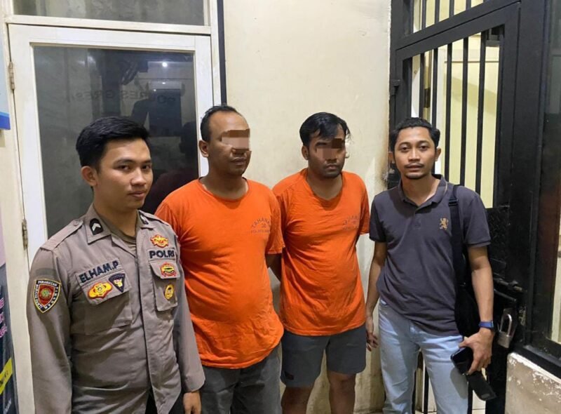 TargetNews.ID/Foto/Satreskrim Polres Gresik Polda Jatim menetapkan dua orang tersangka dalam kasus dugaan penyalahgunaan dan penjualan data pribadi debitur melalui aplikasi Go Matel R4 yang kerap dimanfaatkan oleh debt collector ilegal atau yang dijuluki mata elang (Matel).