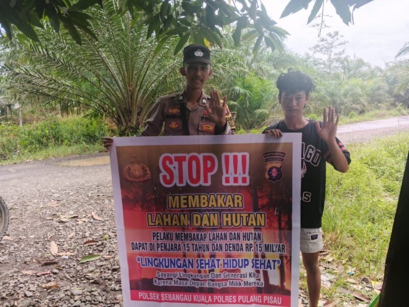 Polsek Sebangau Kuala Mensosialisasikan Himbauan Melarang Membakar Hutan atau lahan kepada Masyarakat